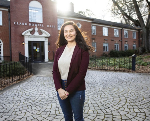 Destiny Loyd in front of Howell Hall on UGA Campus